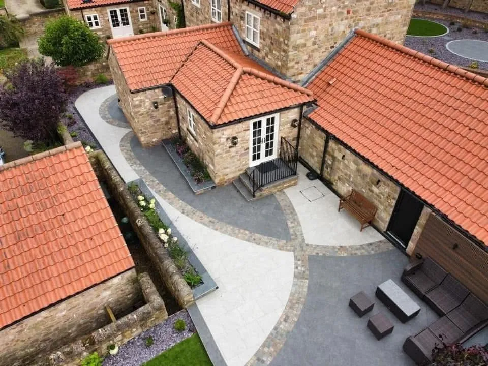 Aerial view of curving paved paths and patio areas